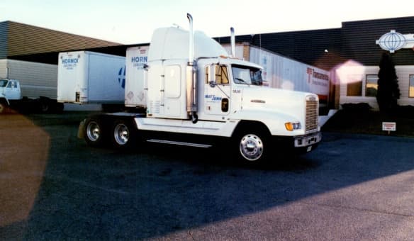 MattJenn Enterprises highway tractor unit MJ-6 parked outside the Regina terminal in the 1990s